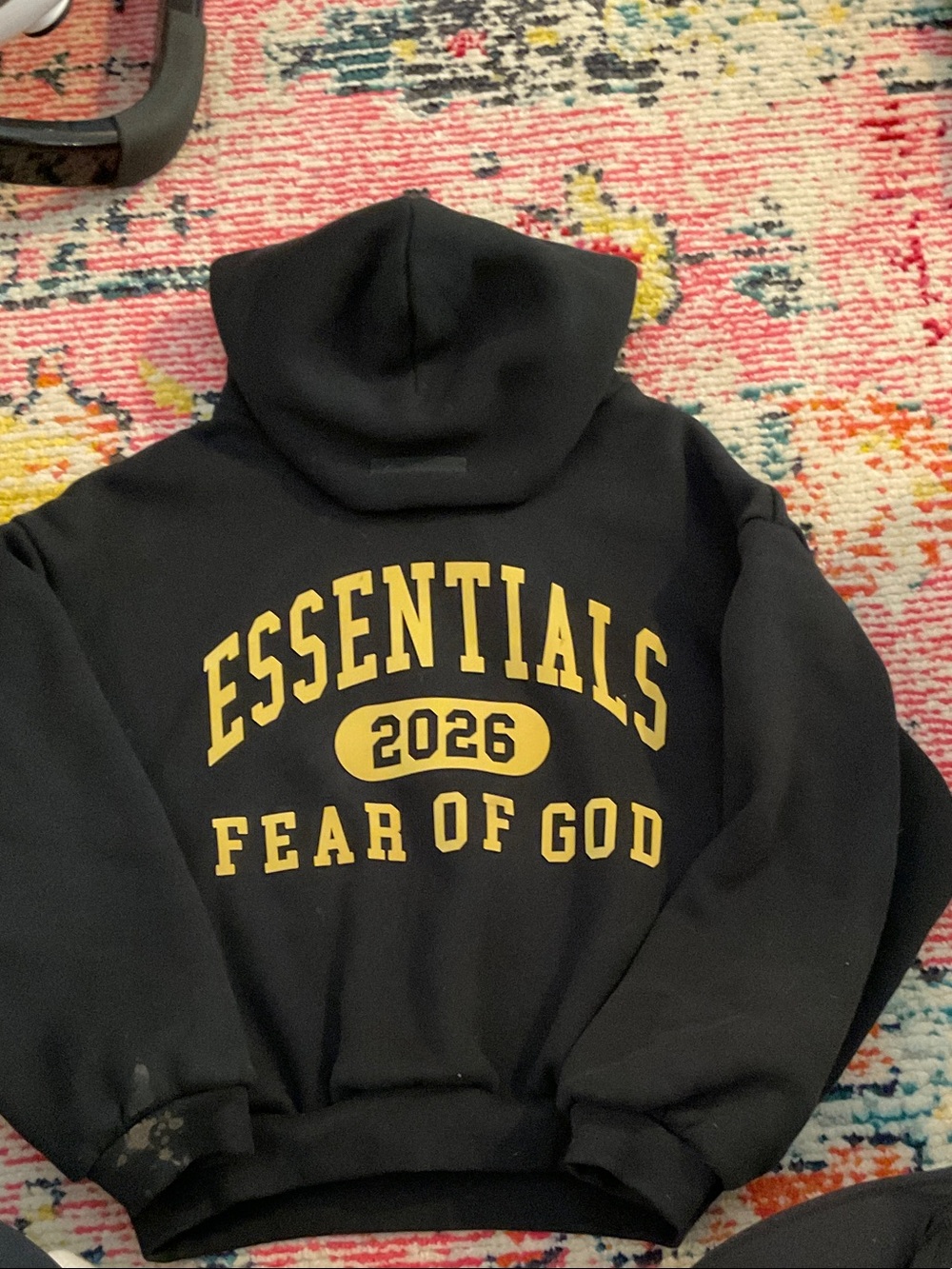Fear of God Essentials 2026 Black Hoodie with Gold Print